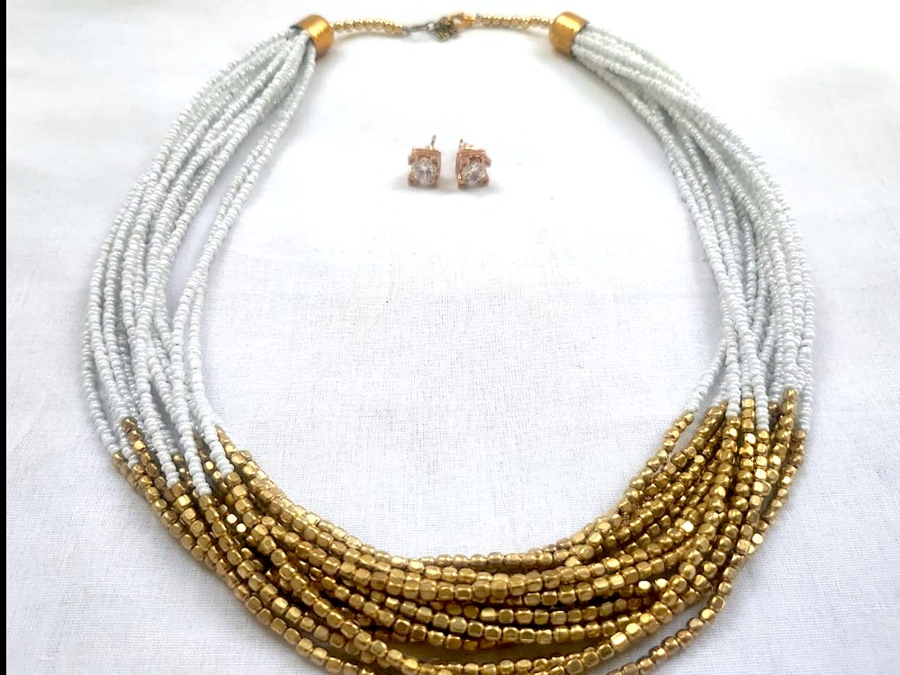 Handcrafted multi-strand necklace and earring set sourced through INDUS CIRCLE